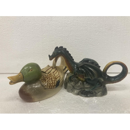 755 - TWO TONY WOOD TEAPOTS TO INCLUDE A DUCK (LID A/F) AND A DRAGON