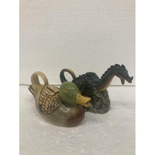 755 - TWO TONY WOOD TEAPOTS TO INCLUDE A DUCK (LID A/F) AND A DRAGON