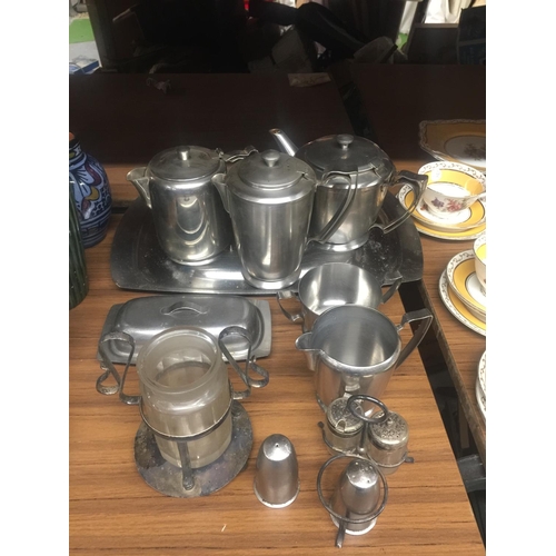 801 - A STAINLESS STEEL TEASET TO INCLUDE TEAPOT, COFFEE POT, HOT WATER POT, CREAM JUG, SUGAR BOWL, CONDIM... 