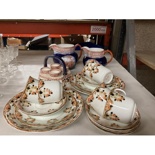 818 - A QUANTITY OF OSBOURNE CHINA TO INCLUDE CUPS, SAUCERS, SIDE PLATES, EGG CUPS IN A STAND PLUS TWO RID... 