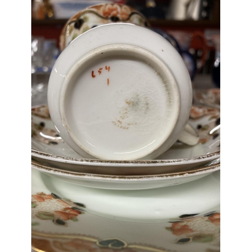 818 - A QUANTITY OF OSBOURNE CHINA TO INCLUDE CUPS, SAUCERS, SIDE PLATES, EGG CUPS IN A STAND PLUS TWO RID... 