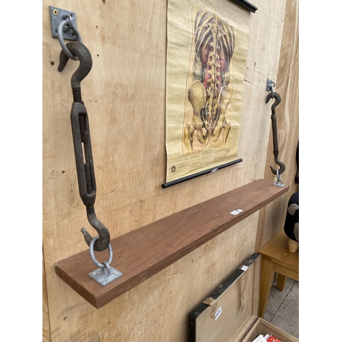 1216 - AN INDUSTRIAL TURNBUCKLE FLOATING MAHOGANY SHELF (L:114CM)