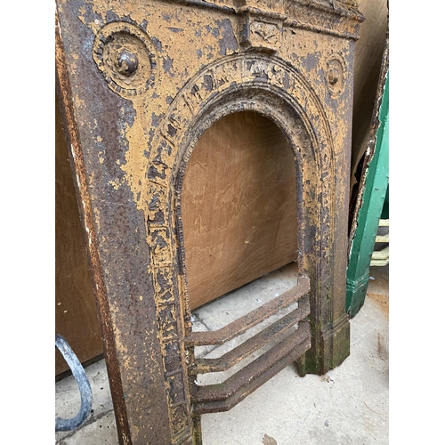 1281 - A DECORATIVE CAST IRON FIRE PLACE