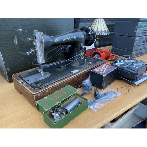 1391 - AN ASSORTMENT OF ITEMS TO INCLUDE A SINGER SEWING MACHINE, A LAMP AND A R/C CAR CONTROLLER ETC