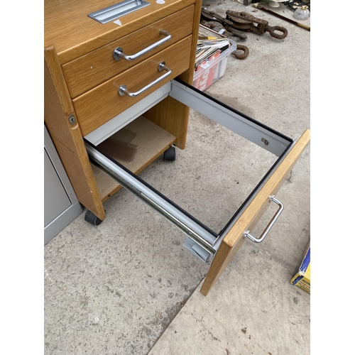 1715 - A WOODEN THREE DRAWER CABINET AND A FOUR DRAWER METAL FILING CABINET