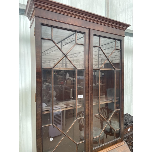 2208 - AN EDWARDIAN ASTRAGAL GLAZED TWO DOOR BUREAU BOOKCASE WITH FITTED INTERIOR AND FOUR GRADUATED DRAWER... 