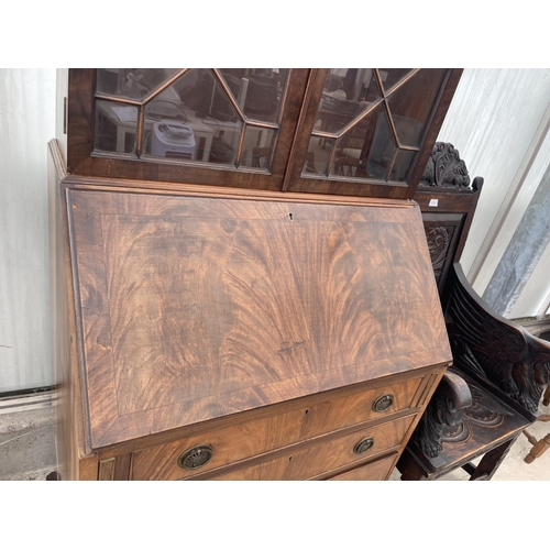 2208 - AN EDWARDIAN ASTRAGAL GLAZED TWO DOOR BUREAU BOOKCASE WITH FITTED INTERIOR AND FOUR GRADUATED DRAWER... 