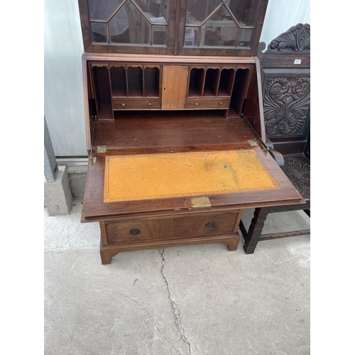 2208 - AN EDWARDIAN ASTRAGAL GLAZED TWO DOOR BUREAU BOOKCASE WITH FITTED INTERIOR AND FOUR GRADUATED DRAWER... 