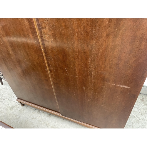 2256 - A MAHOGANY TWO DOOR COMPACTUM WARDROBE