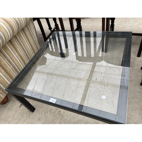 2284 - A MODERN BLACK PAINTED METALWARE FRAMED COFFEE TABLE WITH GLASS TOP, 29