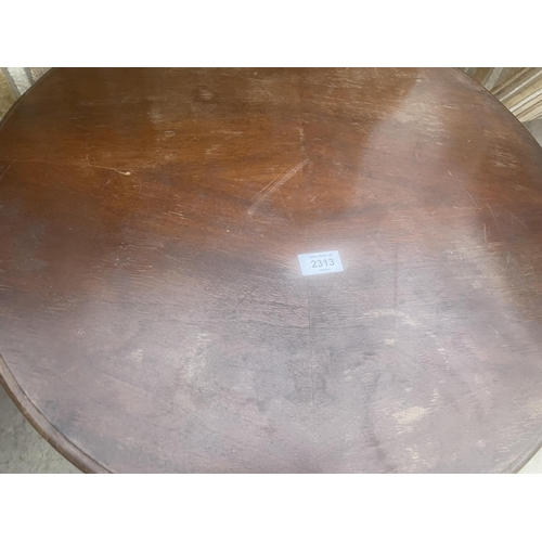 2313 - A MODERN OVAL PINE TRIPOD TABLE, TWO TOP INSET WITH OLD PENNIE AND FOUR GROOVES AND ROUND COFFEE TAB... 