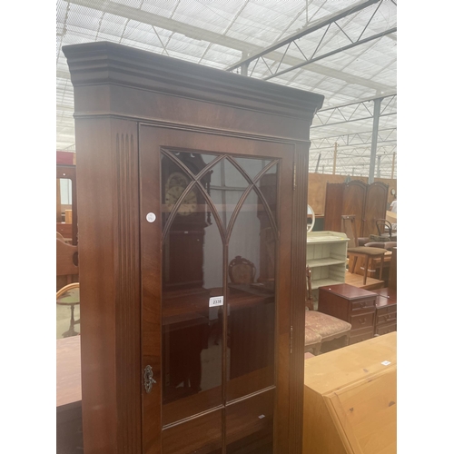 2338 - A MAHOGANY CORNER CUPBOARD WITH LOWER DOOR AND UPPER GLAZED PANEL DOOR