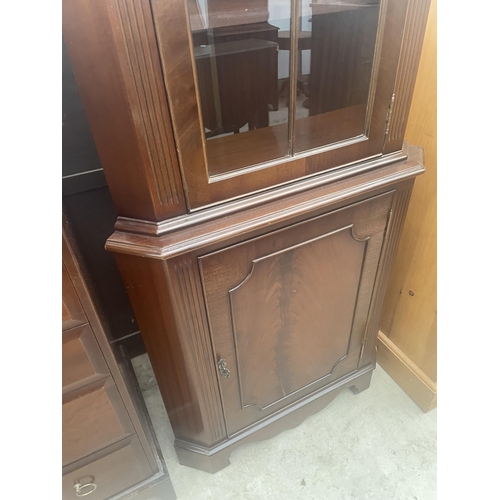 2338 - A MAHOGANY CORNER CUPBOARD WITH LOWER DOOR AND UPPER GLAZED PANEL DOOR