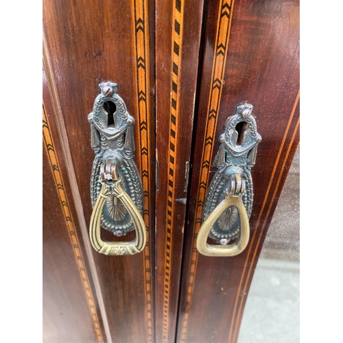 2380 - AN EDWARDIAN MAHOGANY AND INLAID MIRROR-DOOR WARDROBE WITH TWO DRAWERS TO THE BASE, 75