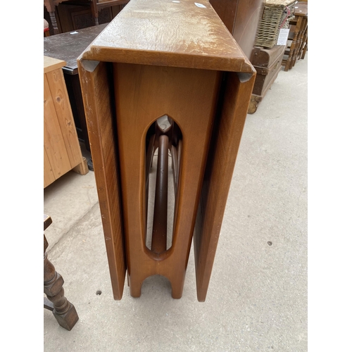 2387 - A RETRO TEAK DROP-LEAF DINING TABLE AND MAHOGANY CORNER CUPBOARD