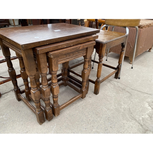 2389 - A NEST OF THREE TABLES, SMALL OAK OCASIONAL TABLE, STOOL ON CHROME LEGS AND LLOYD LOOM OTTOMAN