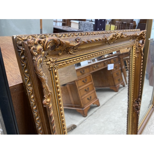 2410 - A MODERN GILT FRAMED WALL MIRROR, 36X26