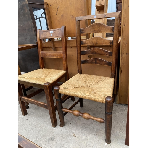 2415 - TWO ELM LADDER BACK DINING CHAIRS WITH RUSH SEATS