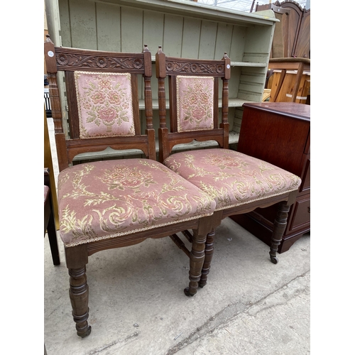 2421 - A PAIR OF EDWARDIAN OAK DINING CHAIR AND PIANO STOOL WITH LIFT-UP LID