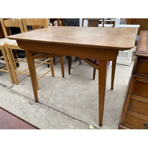 2425 - A BEAUTILITY TEAK RETRO OAK DINING TABLE