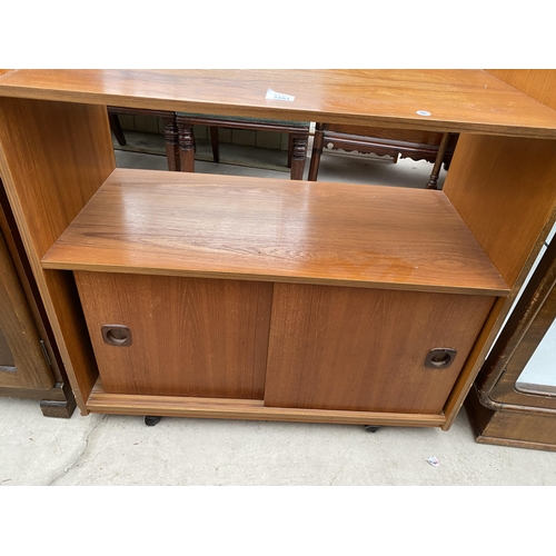 2504 - A RETRO TEAK OPEN BOOKCASE WITH TWO SLIDING DOORS TO BASE, 32