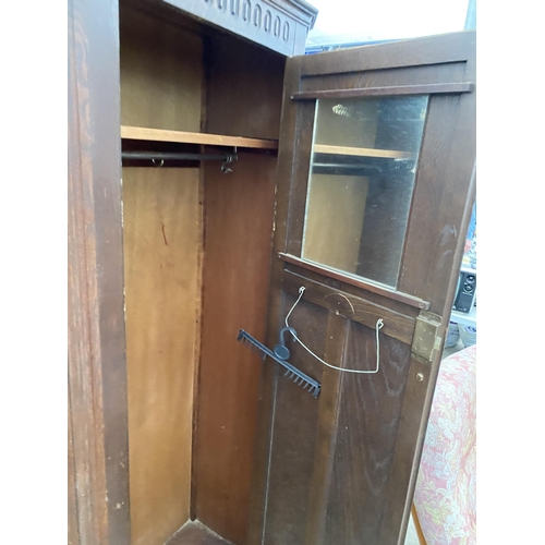 2544 - A MID 20TH CENTURY OAK HALL WARDROBE, 32