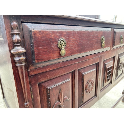 2548 - AN EARLY 20TH CENTURY OAK SIDEBOARD ON BARLEYTWIST LEGS, 54