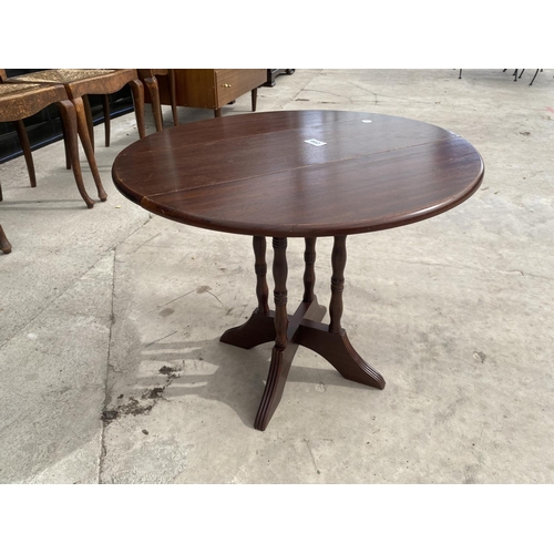 2558 - A REPRODUCTION MINIATURE MAHOGANY DROP LEAF TABLE