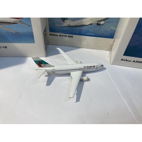 2856 - FOUR HERPA WINGS COLLECTION PLANES TO INCLUDE - APOLLO AIRLINES AIRBUS A300B4 NO. 501880, AIRNIUGINI... 