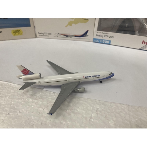 3028 - A COLLECTION OF FOUR COLLECTOR'S AEROPLANES TO INCLUDE CHINA AIRLINES BOEING McDONNELL DOUGLAS MD-11... 