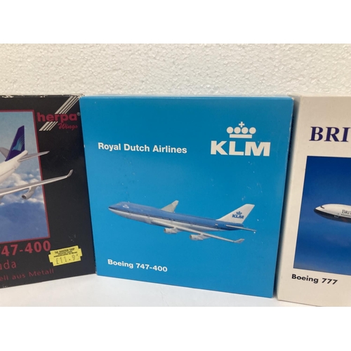 3029 - A COLLECTION OF FOUR COLLECTOR'S AEROPLANES TO INCLUDE EAST MIDLANDS AIRPORT BOEINGH 777-300 NO. 506... 