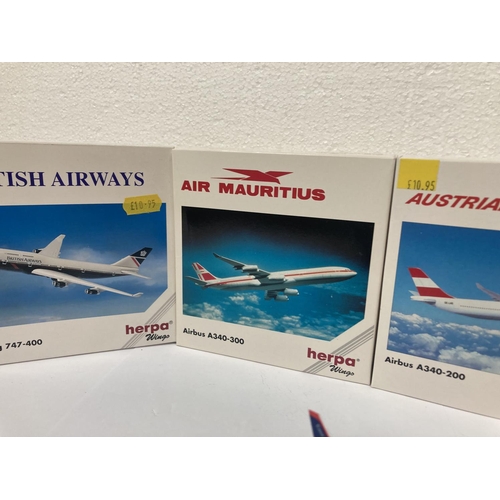 3031 - A COLLECTION OF FOUR COLLECTOR'S AEROPLANES TO INCLUDE EAST MIDLANES AIRPORT BOEING 777-300 NO. 5064... 