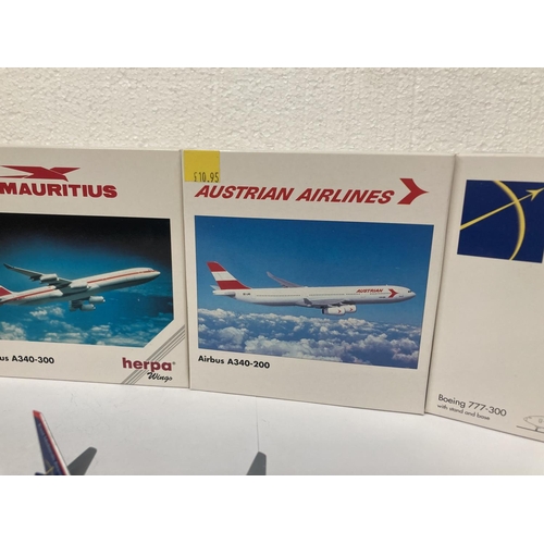 3031 - A COLLECTION OF FOUR COLLECTOR'S AEROPLANES TO INCLUDE EAST MIDLANES AIRPORT BOEING 777-300 NO. 5064... 