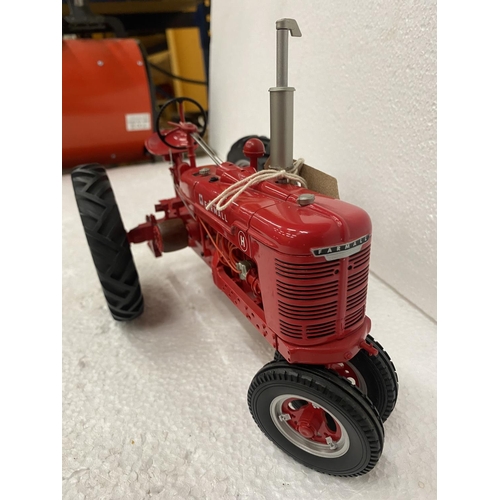 3057 - A FRANKLIN MINT 1:12 SCALE DIECAST MODEL OF A FARMALL TRACTOR