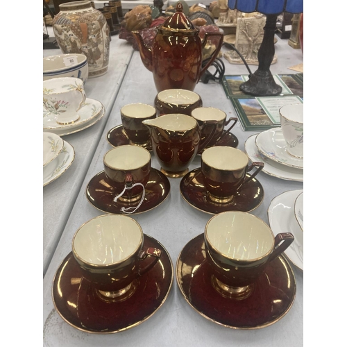 76 - A CARLTON WARE ROUGE ROYALE COFFEE SET TO INCLUDE COFFEE SET, SUGAR BOWL, CREAM JUG, CUPS AND SAUCER... 