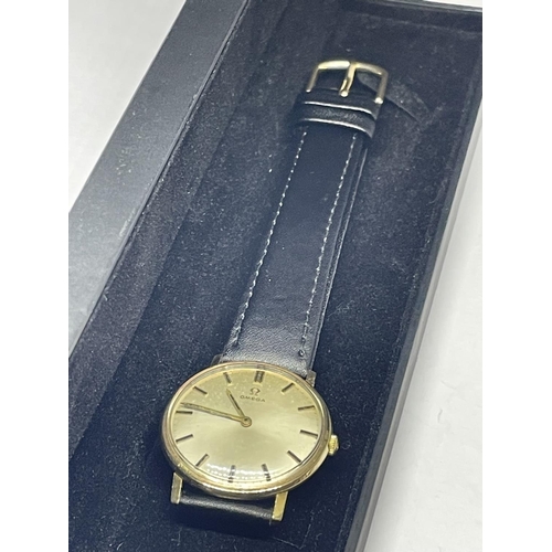 603 - A 9 CARAT GOLD VINTAGE OMEGA WRIST WATCH IN A PRESENTATION BOX SEEN WORKING BUT NO WARRANTY