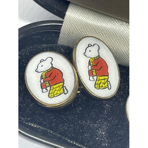 678 - A PAIR OF RUPERT THE BEAR CUFFLINKS