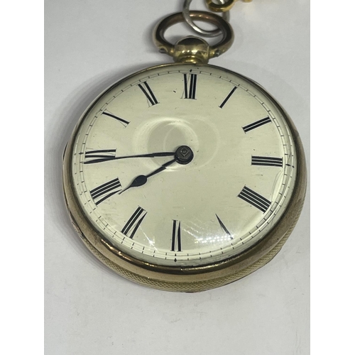 683 - AN EARLY GOLD PLATED POCKET WATCH WITH KEY