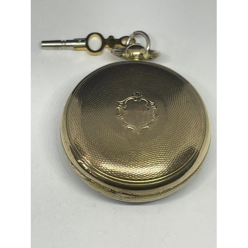 683 - AN EARLY GOLD PLATED POCKET WATCH WITH KEY