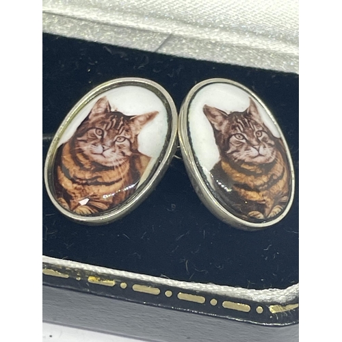 695 - A PAIR OF SILVER CAT CUFFLINKS IN A PRESENTATION BOX