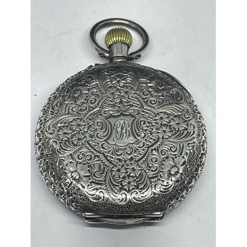 698 - A DECORATIVE SILVER FOB WATCH