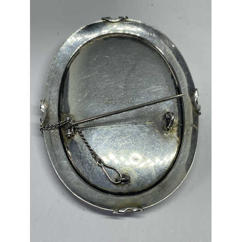 701 - TWO SILVER BROOCHES TO INCLUDE A CAMEO