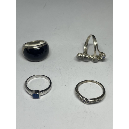 711 - FOUR MARKED SILVER RINGS