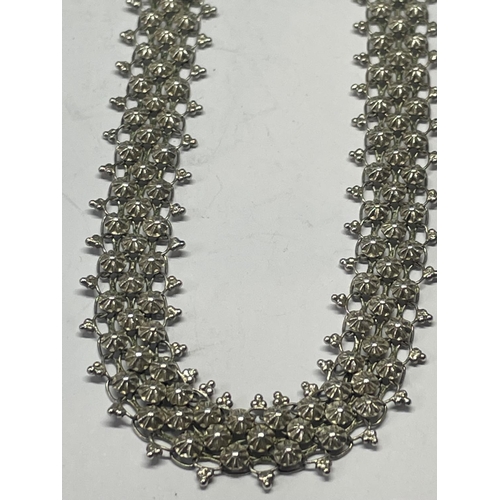 713 - A MARKED SILVER NECKLACE