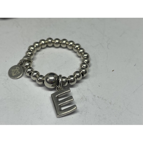 716 - A SILVER BRACELET AND SILVER RING