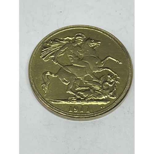 723 - A YELLOW METAL COIN