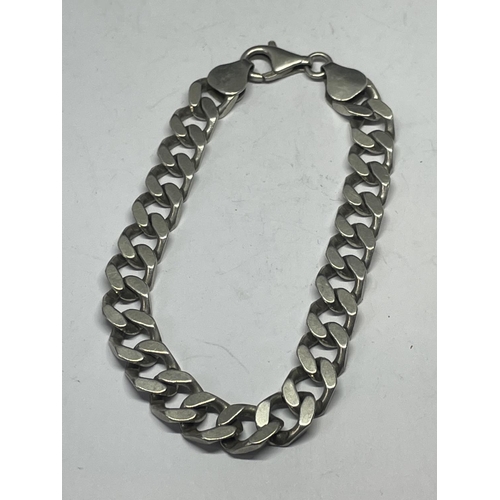 728 - A HEAVY SILVER BRACELET