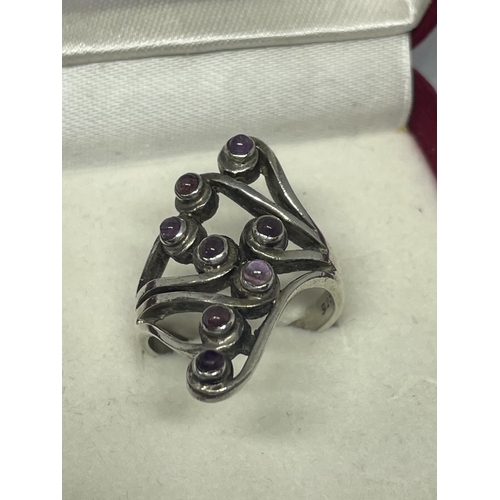 729 - AN ORNATE SILVER DRESS RING SIZE P IN A PRESENTATION BOX