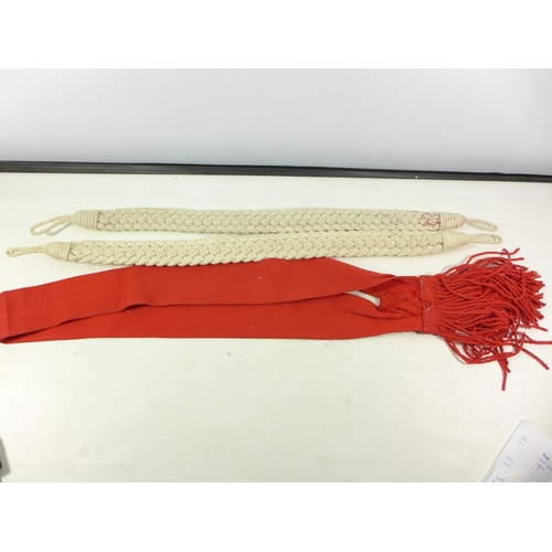 473 - TWO BRITISH ARMY RED SASHES, LENGTH 90CM, AND TWO CORDED, U.S. AIRBORNE CANVAS BAG, TWO BELTS AND A ... 