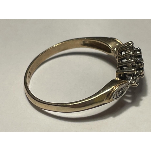 607 - A 9 CARAT GOLD RING WITH A CENTRE DIAMOND SIZE N/O